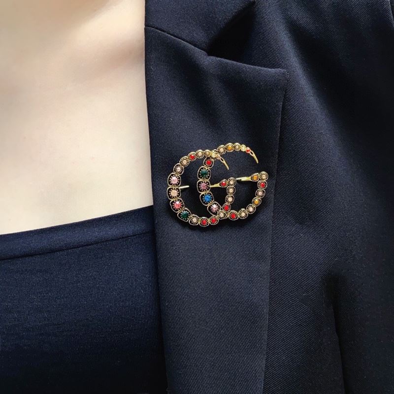 Gvc*1 brooches